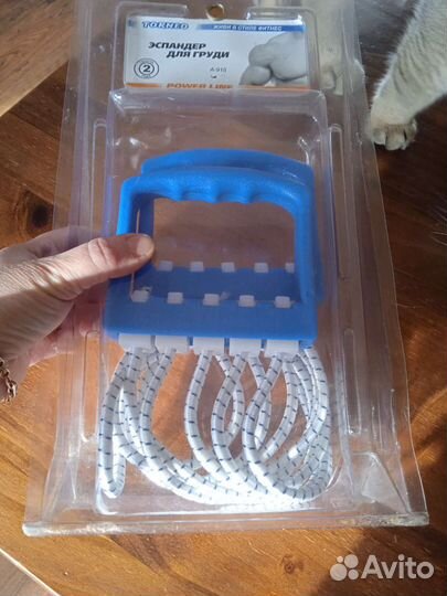 Эспандер для груди Torneo в упаковке