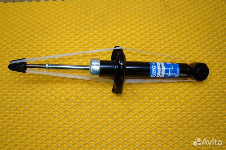 Амортизатор подвески задний Nissan Almera