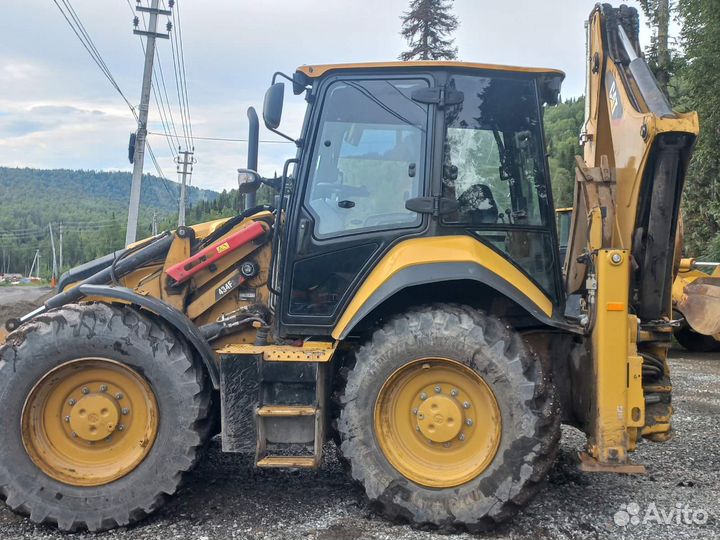 Экскаватор погрузчик caterpillar