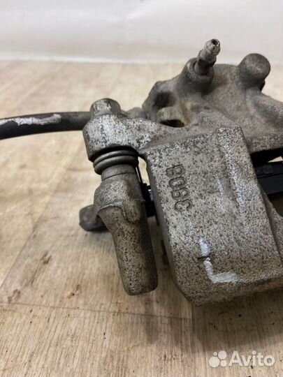 Суппорт задний левый Mitsubishi Outlander CW5W