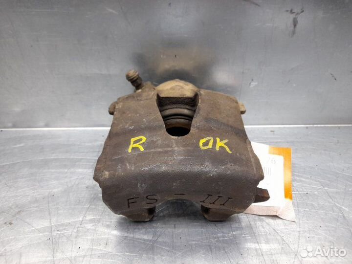Суппорт тормозной передний правый Volkswagen Golf