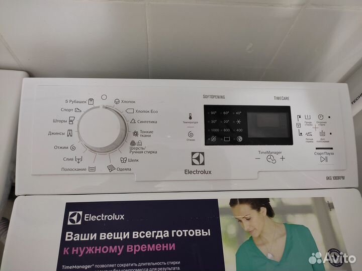 Стиральная машинка с вертикальной загрузкой