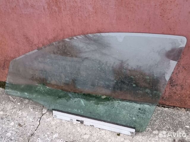 Стекло двери передней левой Opel Astra H