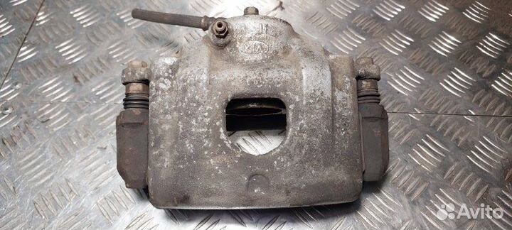 Суппорт тормозной передний правый Kia Cerato седан