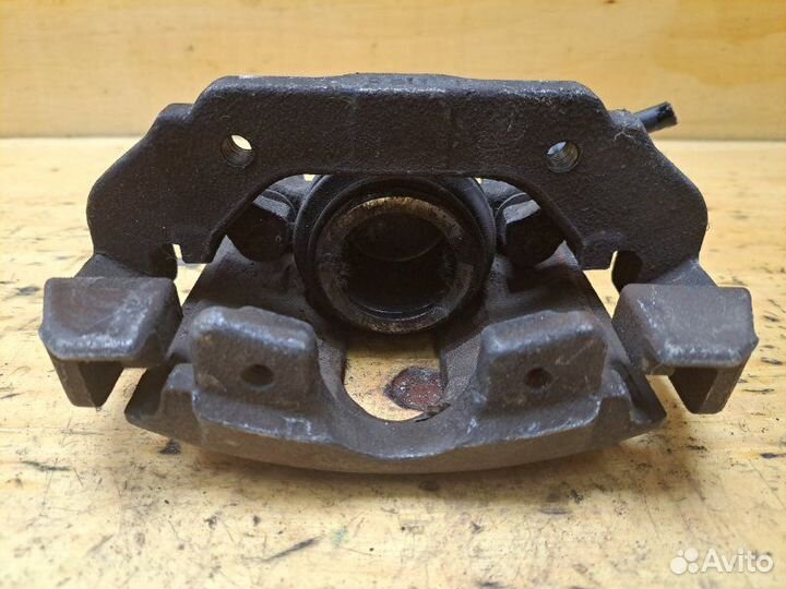 Суппорт передний правый Mazda Demio DY3W zjve 2003