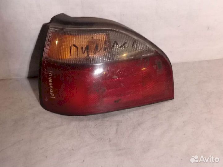 Фонарь (стоп сигнал) левый 4607 Nissan Pulsar EN14