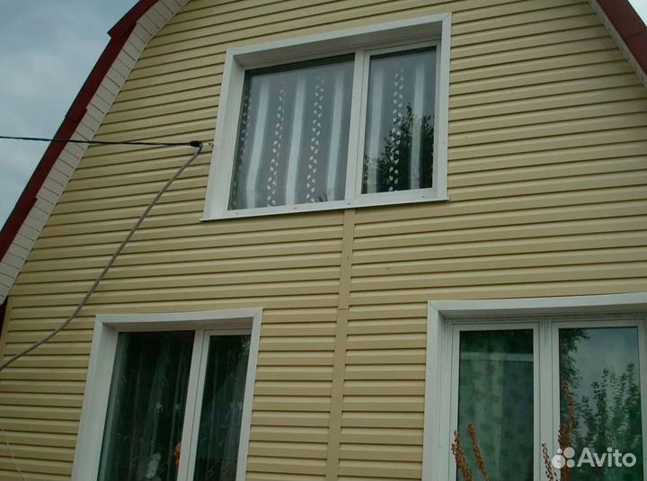 Сайдинг металлический под дерево