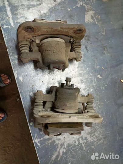 Суппорт тормозной передний Chery Indis