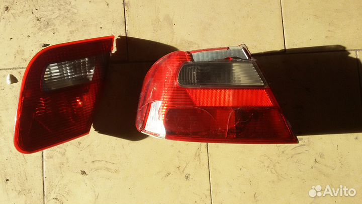 Фонарь левый Mitsubishi Carisma седан рестайлинг