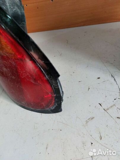 Фонарь задний Mazda 323