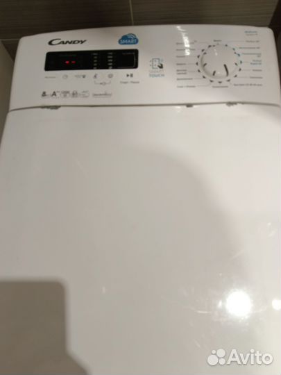 Стиральная машина с вертикальной загрузкой candy