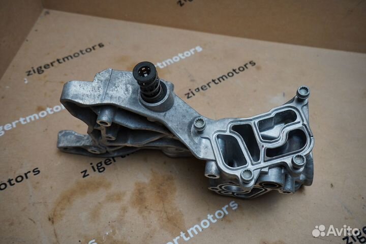 Кронштейн генератора 06J903143AH