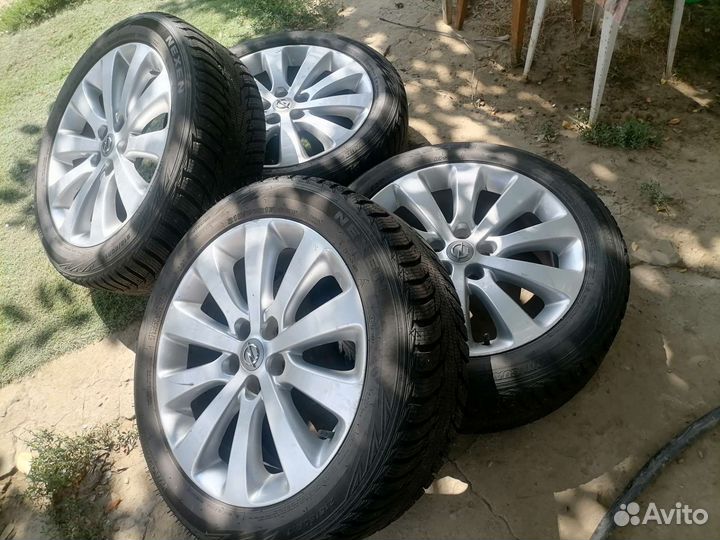 Зимния резина на дисках opel astra 215/50 R17