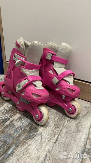 Роликовые коньки