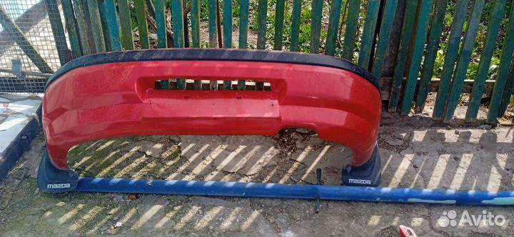 Бампер на Мазду 323f