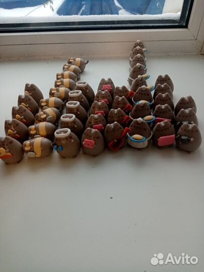 Игрушки котики пушины