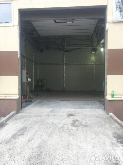 Сeкциoнные гаражные ворoта Алютex