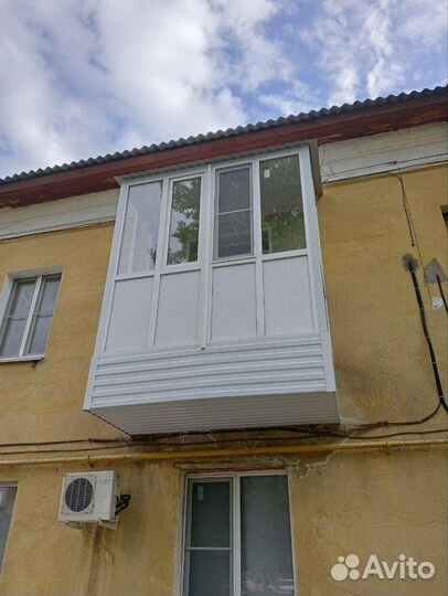 Пластиковые окна и балконы