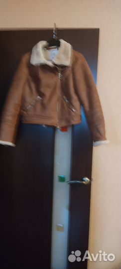 Рыжая маленькая курточка, очень симпатичная