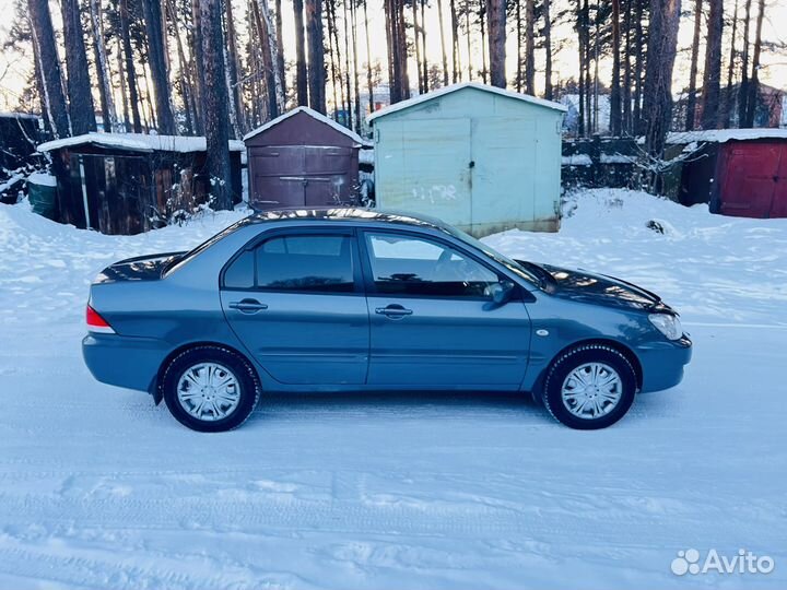 Mitsubishi Lancer 1.6 AT, 2009, битый, 290 000 км