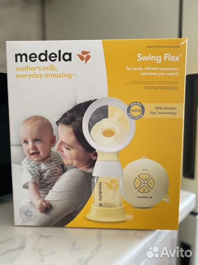 Молокоотсос medela электрический