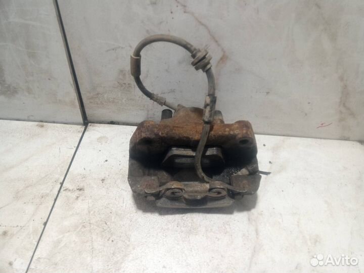 Суппорт тормозной передний левый Volkswagen T5