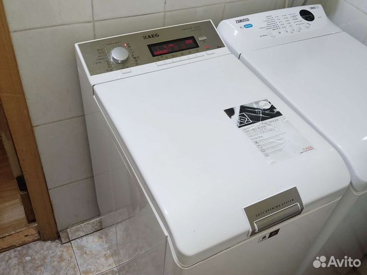 AEG с вертикальной загрузкой 6 кг 1500 об