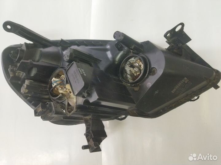 Фара левая Opel Zafira B 2005-2012