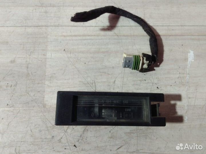 Освещение номерного знака заднее Opel Meriva A