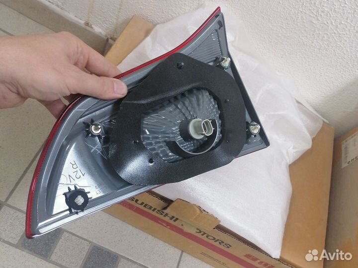 Фонарь задний левый mitsubishi pajero sport2 ориги