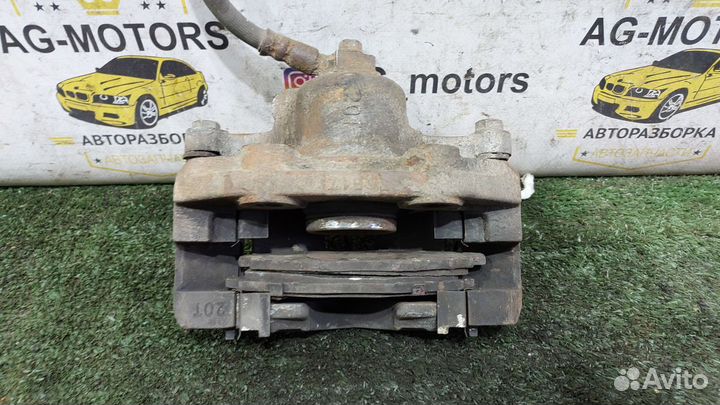 Супорт тормозной передний левый Шевроле Ланос