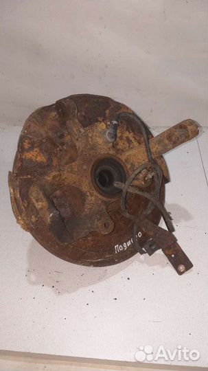 Поворотный кулак перед Mitsubishi Pajero Sport