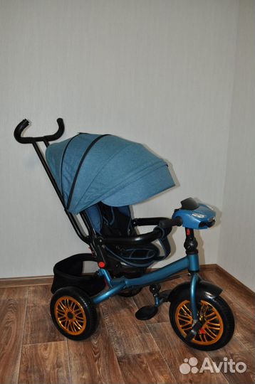 Велосипед коляска с ручкой в отличном состоянии