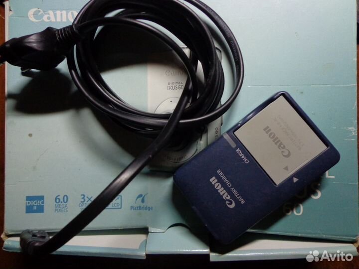 Зарядное к фотоаппарату Canon