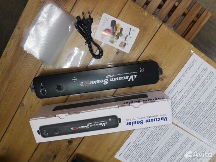 Вакуумный упаковщик