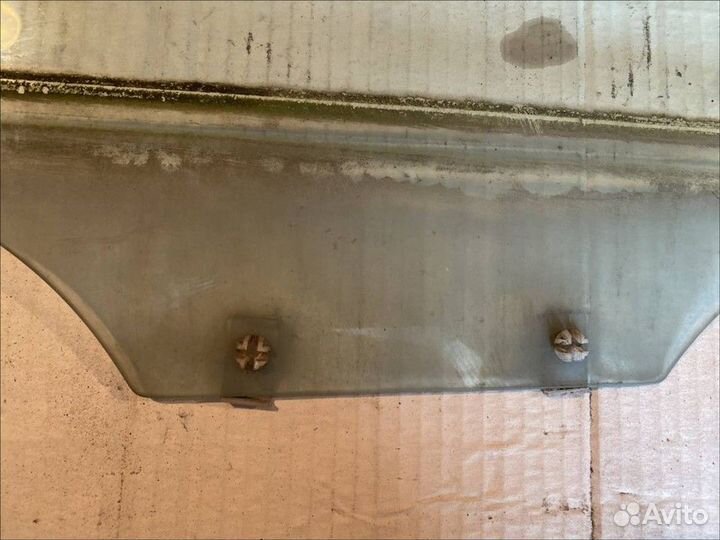 Стекло двери передней правой Kia Spectra