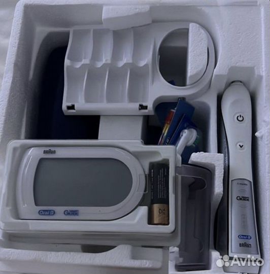 Электрическая зубная щетка