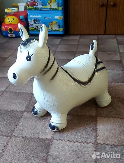 Игрушка попрыгун ослик