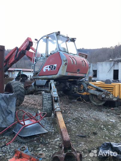 Колёсный экскаватор MENZI Muck A91 Mobil, 2003