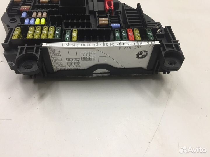 Блок предохранителей салонный задний (BMW X3)