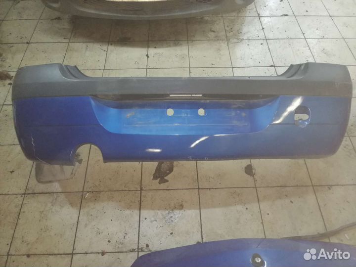 Задний бампер Рено Логан