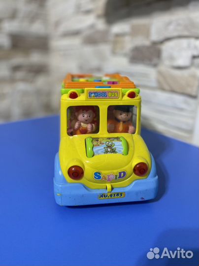 Игрушка музыкальный автобус