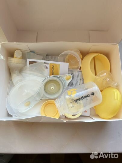 Молокоотсос medela