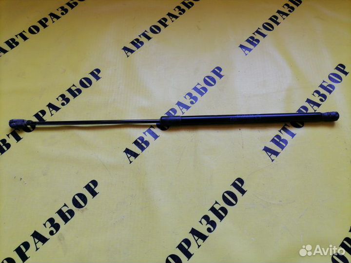 Амортизатор крышки багажника Opel Corsa D