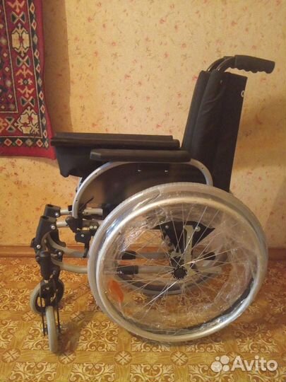 Инвалидная коляска новая