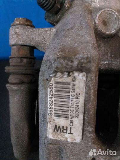 Суппорт тормозной задний левый Ситроен С4