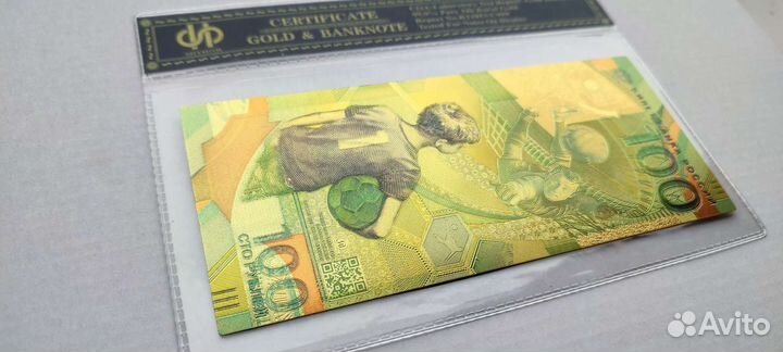 Сувенирная золотая банкнота уефа в России