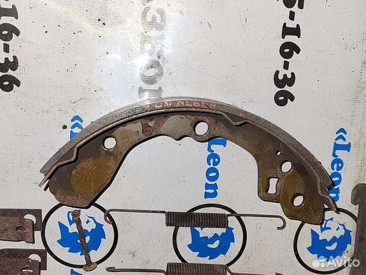 Тормозной механизм ручника левый KIA sephia