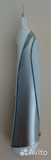 Электрическая зубная щетка с насадками