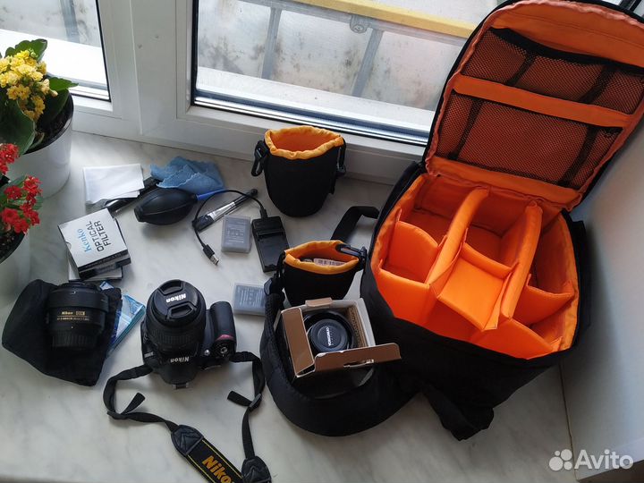 Зеркальный фотоаппарат nikon d3100 с 35mm, 50mm